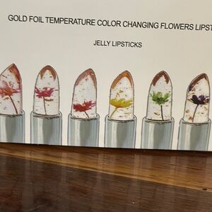Moisturizing gold foil lipstick. bidding on one. Changes color based on ph